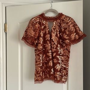 Anthropologie sequin tie back sparkle shirt. New with tags. Size XS.